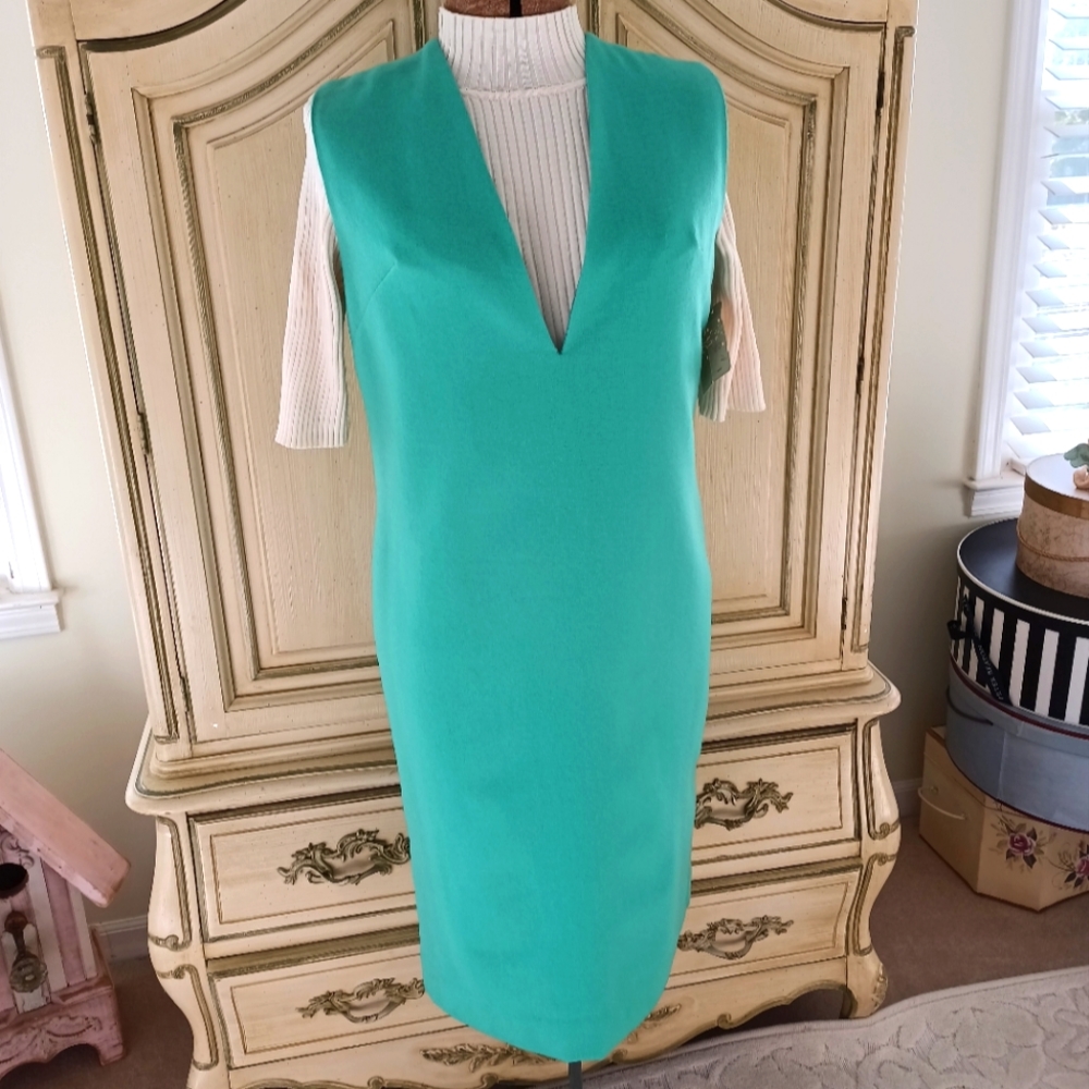 1960S ALL WOOL, FULLY LINED, GREEN JUMPER WITH ORIGINAL TAGS!